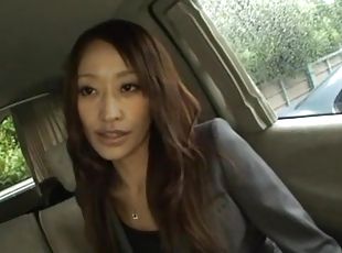 Gorgeous Japanese babe Yuu Kanda gives a blowjob in the van