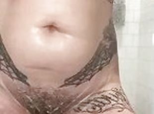 Inked Ginger shaving hairy pussy bush close up in the shower and pl...