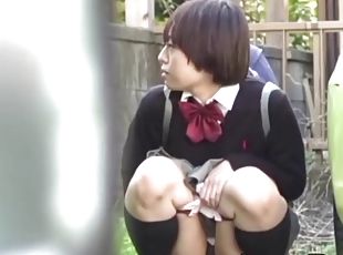 Japanese amateur pissing outdoors in a secret chamber