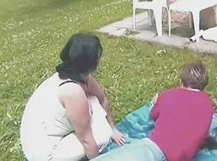 Chubby Brunette Mom Outdoors by young Guy