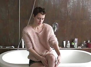 Angora sweater girl strips and hops in the bathtub to finger