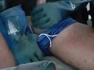 Horny hunk in arm-length chemical gloves jerk til ejaculation in th...