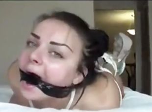 My deepthroat slut is hogtied on my bed and shows me her deepthroat...