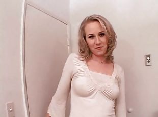 Blonde goes topless and sucks a stiff dick