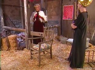Tara is fucked in a barn by a guy while wearing stockings