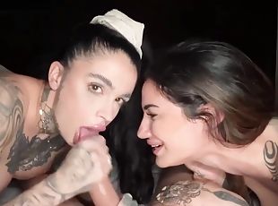Two Amazing Brunettes With Tattoos Are Taking Turns Sucking