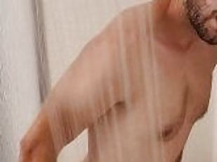 Twink w/tan-lines rides dildo in shower