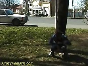 Sexy gal pees in public