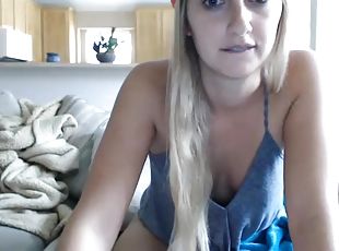 Skinny blonde teasing on the webcam