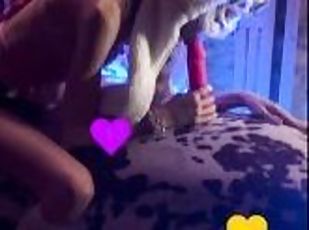 Kiki licks her pink dildo
