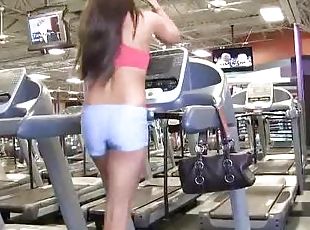 Brunette Teal is showing her sexy body in gym