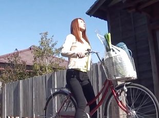 Cardigan cutie on a bike welcomes cock into her Japanese pussy