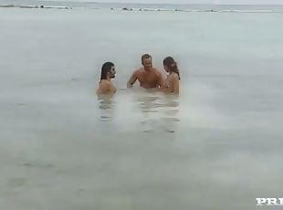 Sensual threesome sex on the beach with two angels