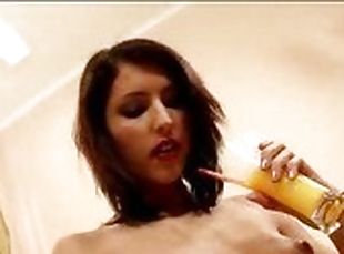 Pouring juice on her naked body