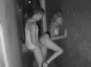Hardcore oral and regular fuck on the hallway under security cam