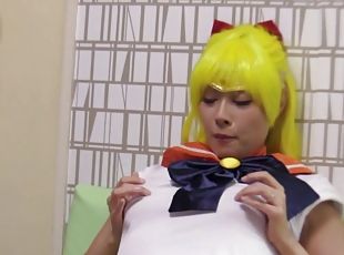 costumed Morishita Mio masturbates on the couch using her dildo