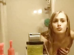 Sexy blonde teen does a striptease after shower