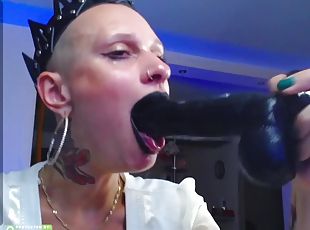 Amateur alt babe deepthroats huge dildo on webcam