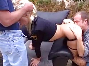 Police woman fucked by two guys outdoors