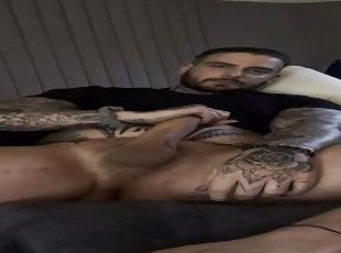Horny tattoed guy loves to jerks off his 9 inch dick every time his...