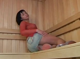 Pissing fetish for a naughty brunette fucking in a sauna