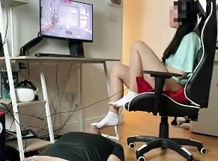Mistress in white socks playing PC games . Locked in chastity boyfriend worshipping socks and feet