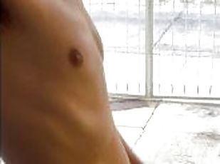 In the garage of my building nude with a boner and stroking my dick...