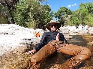 Pissing on myself and cooling off in a river after a hot day of fie...