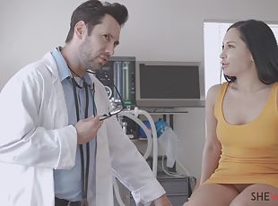 Aroused brunette grants horny doctor the chance to fool around with her pussy