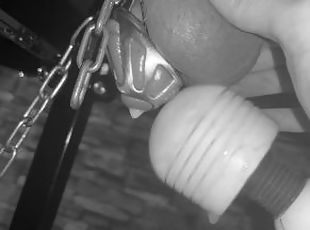 Femdom makes slave cum in chastity cage restrained on the milking t...