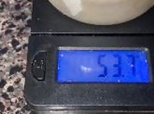 A couple ounces of my cum!!!! Weighing my frozen cum loads on a sca...