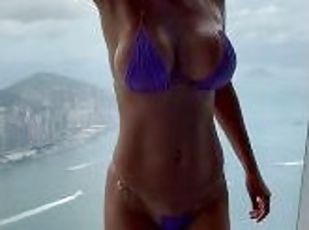 Monika Fox In Purple Bikini Swims In Pool & Poses By Window Against...