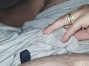 Stepmoms hand slides down her stepsons pants, touching and rubbing his cock