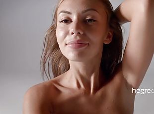 Baby with incredibly sexy body takes off her clothes