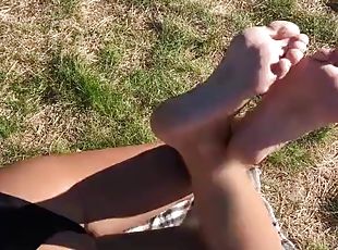 Foot play on the beach and dick flashing