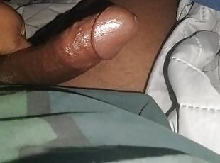 Big black ebony dick being massaged from behind